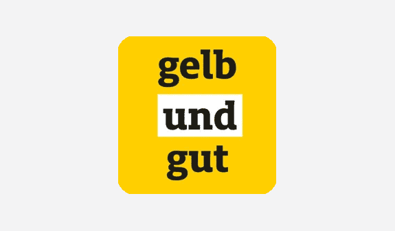 Ein gelbes Schild mit der Aufschrift "gelb und gut" in schwarzen Buchstaben.