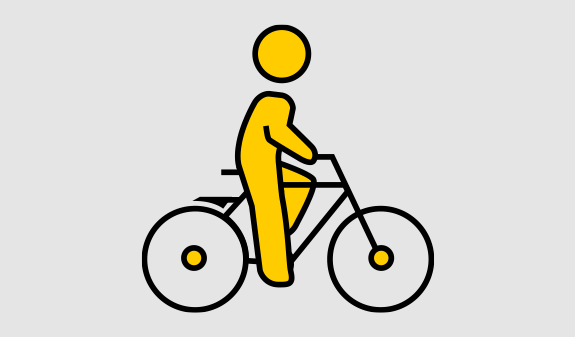 Eine gelbe stilisierte Figur fährt auf einem schwarzen Fahrrad auf grauem Hintergrund